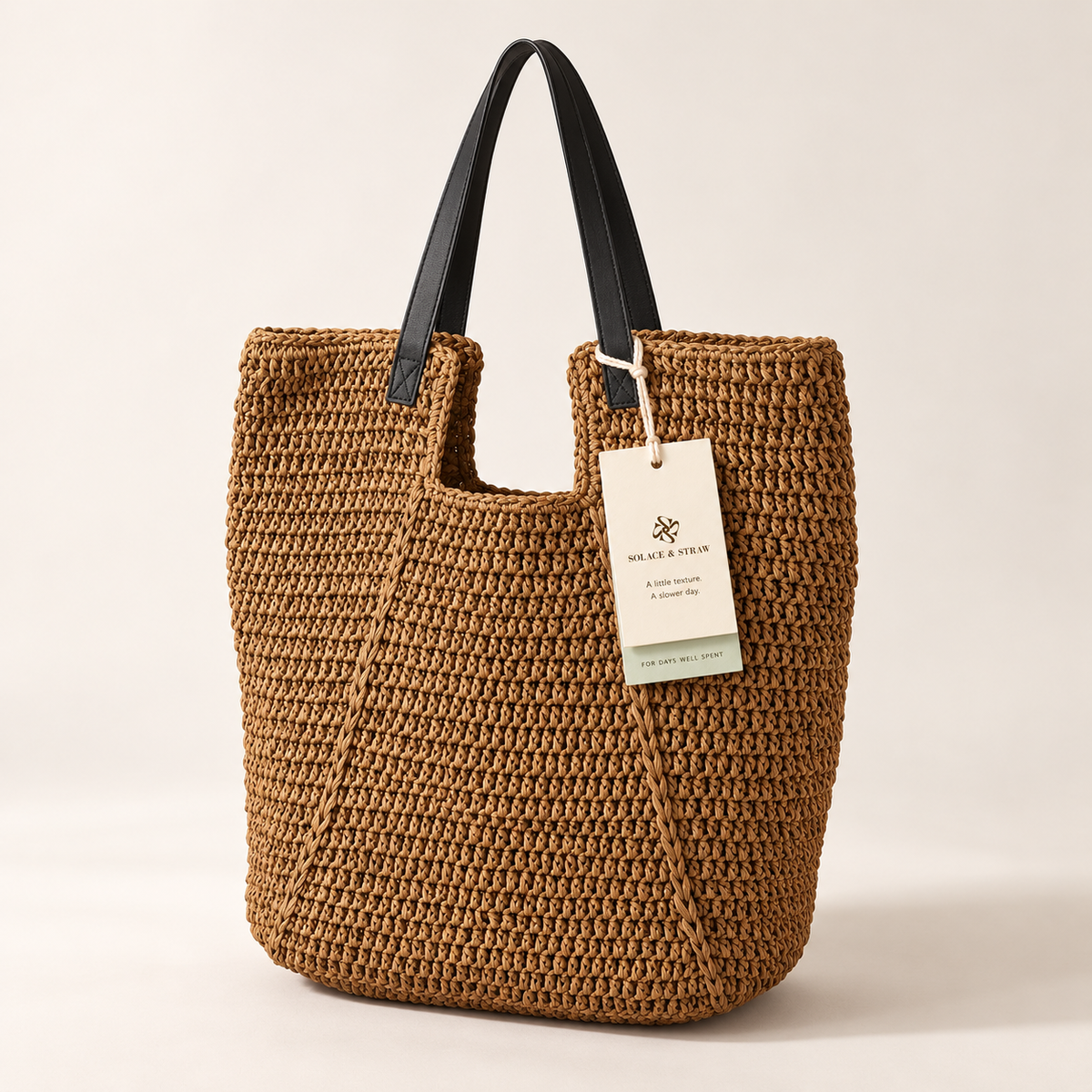 Relaxed Woven Shoulder Bag in tawny brown with a Solace & Straw hangtag