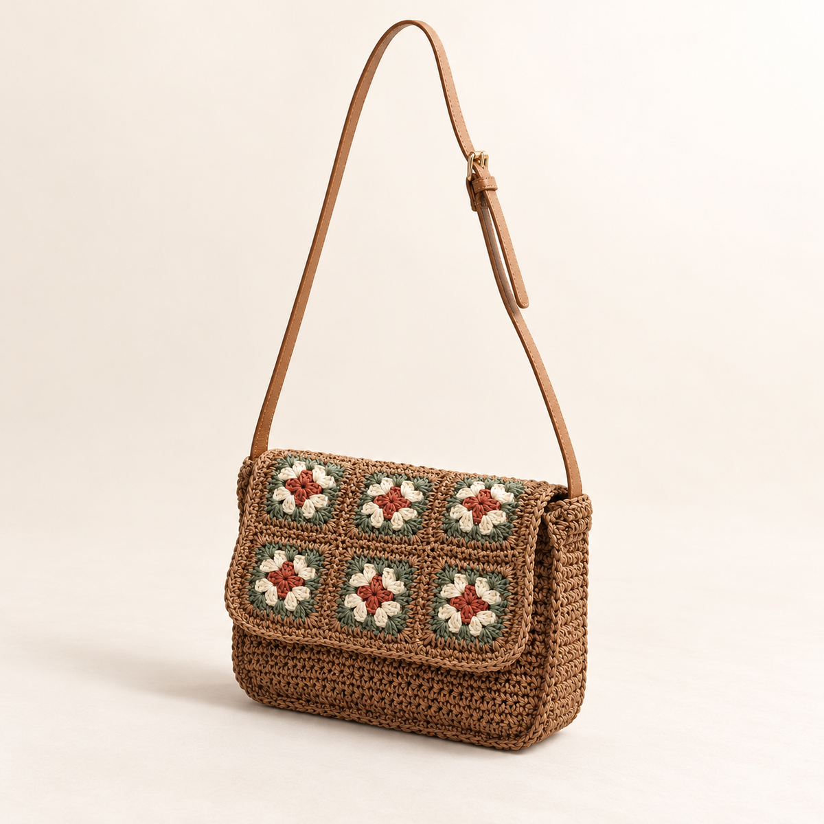 Floral Woven Crossbody, angled view showing floral crochet squares on the flap