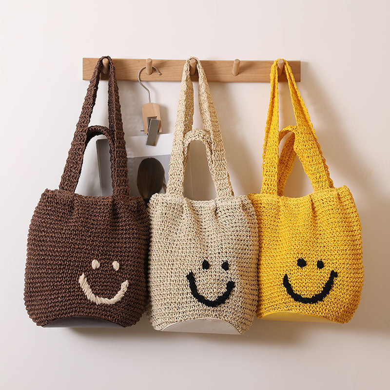 Casual smiley face shoulder cotton thread woven bag new small fresh hand-held commuter straw bag seaside vacation beach bag