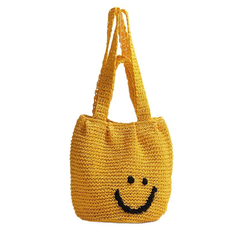 Casual smiley face shoulder cotton thread woven bag new small fresh hand-held commuter straw bag seaside vacation beach bag