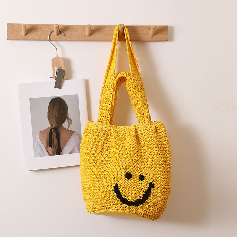Casual smiley face shoulder cotton thread woven bag new small fresh hand-held commuter straw bag seaside vacation beach bag