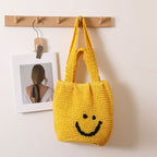 Casual smiley face shoulder cotton thread woven bag new small fresh hand-held commuter straw bag seaside vacation beach bag