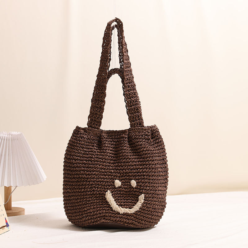 Casual smiley face shoulder cotton thread woven bag new small fresh hand-held commuter straw bag seaside vacation beach bag