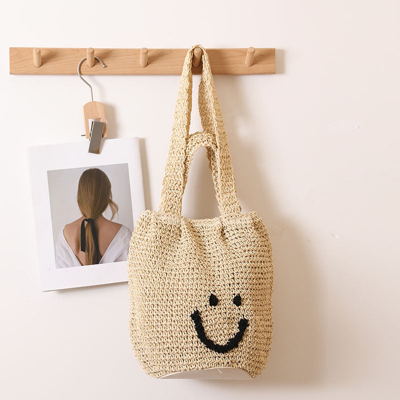 Casual smiley face shoulder cotton thread woven bag new small fresh hand-held commuter straw bag seaside vacation beach bag