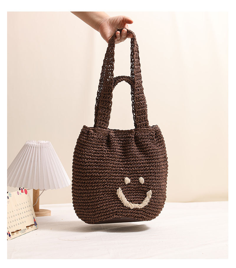 Casual smiley face shoulder cotton thread woven bag new small fresh hand-held commuter straw bag seaside vacation beach bag