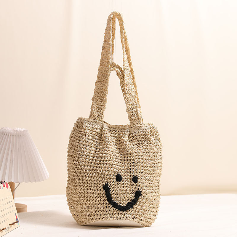 Casual smiley face shoulder cotton thread woven bag new small fresh hand-held commuter straw bag seaside vacation beach bag
