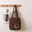 Casual smiley face shoulder cotton thread woven bag new small fresh hand-held commuter straw bag seaside vacation beach bag