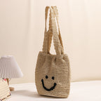 Casual smiley face shoulder cotton thread woven bag new small fresh hand-held commuter straw bag seaside vacation beach bag