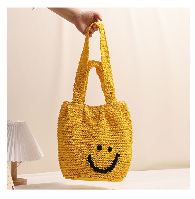 Casual smiley face shoulder cotton thread woven bag new small fresh hand-held commuter straw bag seaside vacation beach bag