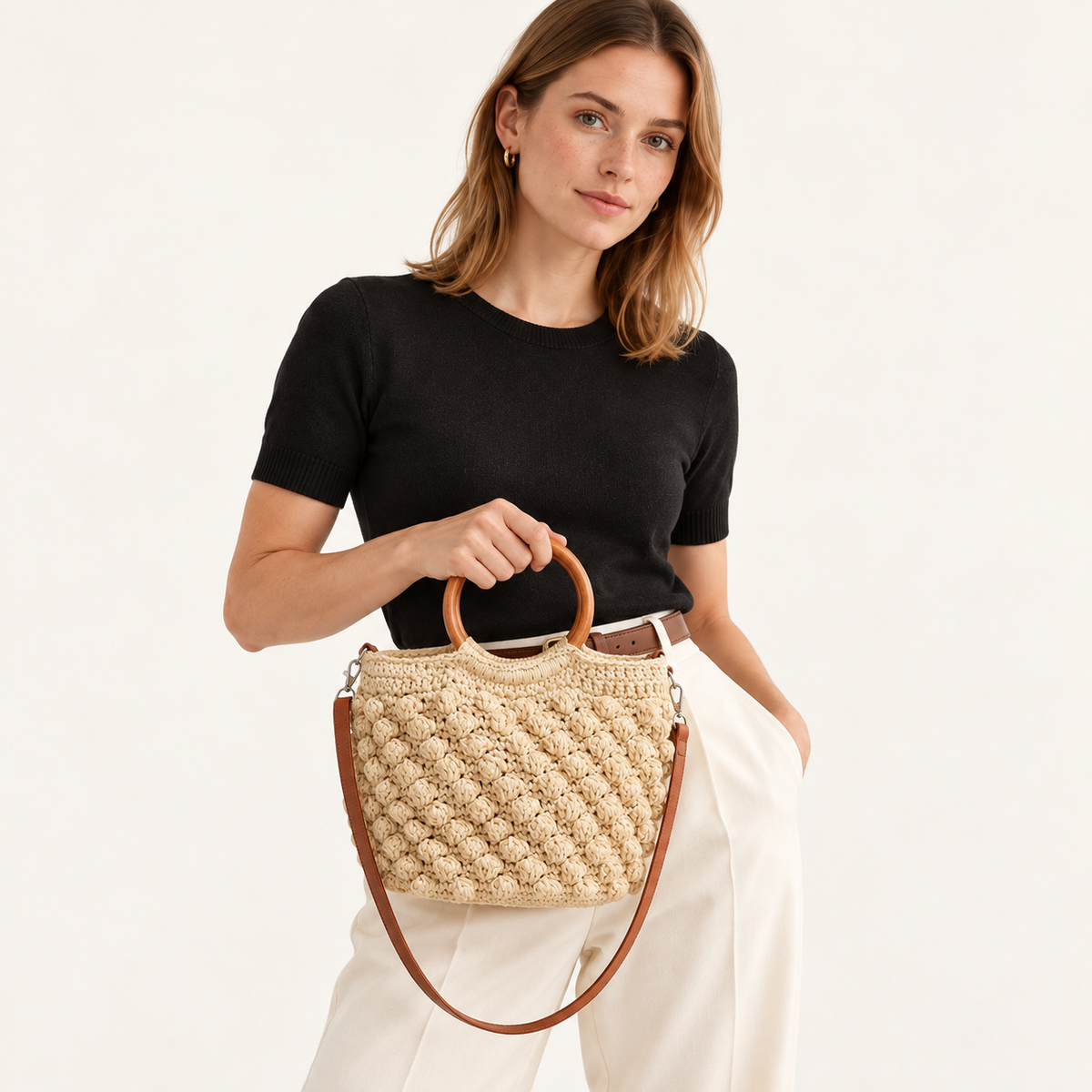 Woman carrying the Wooden Handle Woven Bag with round wooden handles