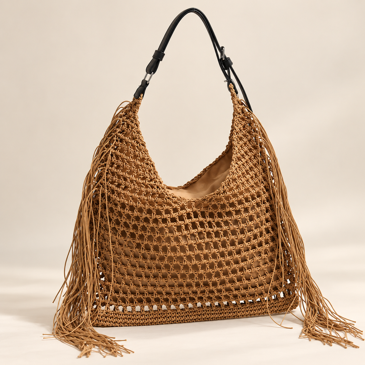 Tassel Woven Tote, angled view showing open crochet and side fringe