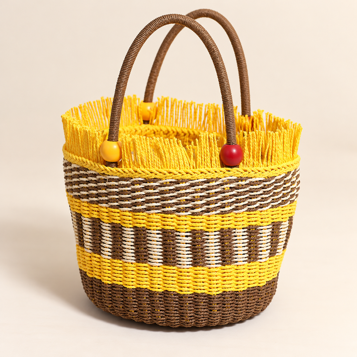 Wooden Bead Bucket Bag, angled view showing beaded handles and a fringed rim