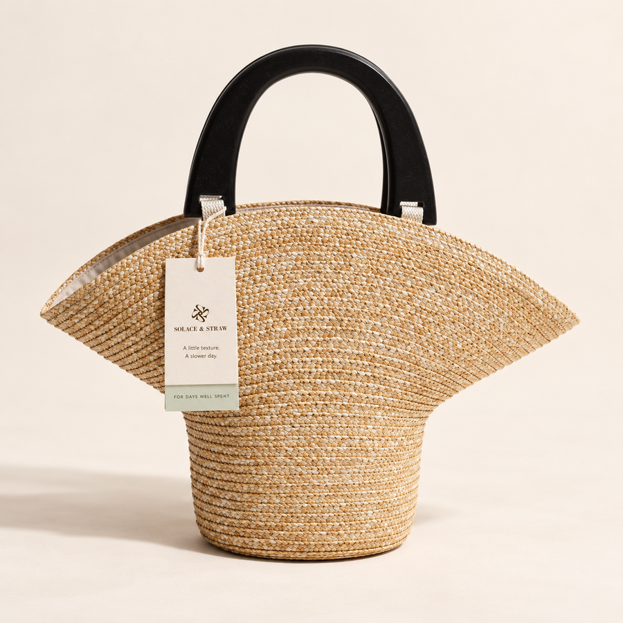 Wood Handle Barrel Bag in natural straw with a Solace & Straw hangtag