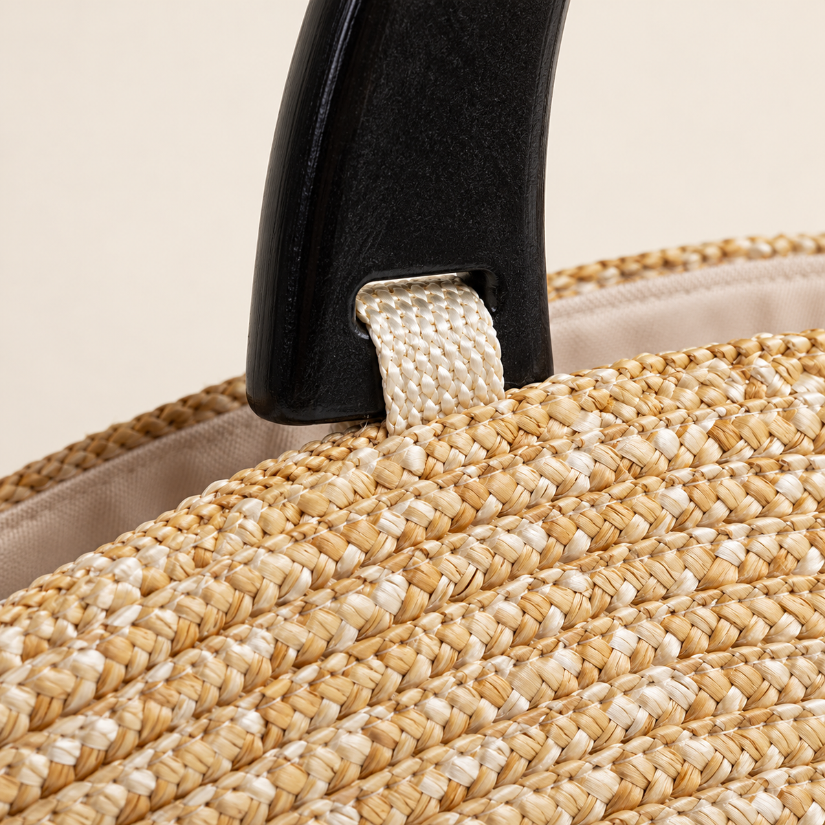 Wood Handle Barrel Bag, close-up of the woven fibers and handle attachment
