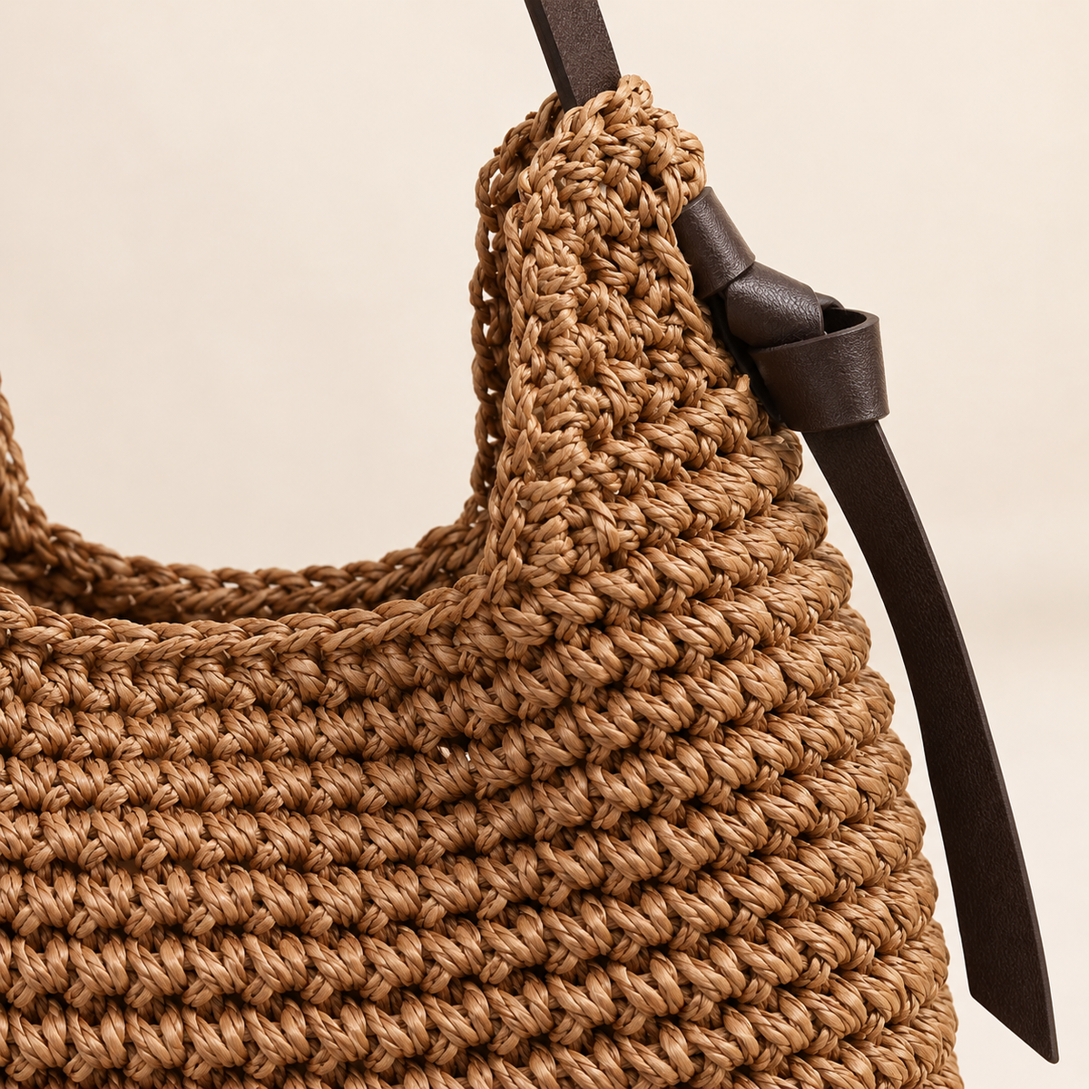 Tassel Cylinder Bag, close-up of the crochet texture and strap join
