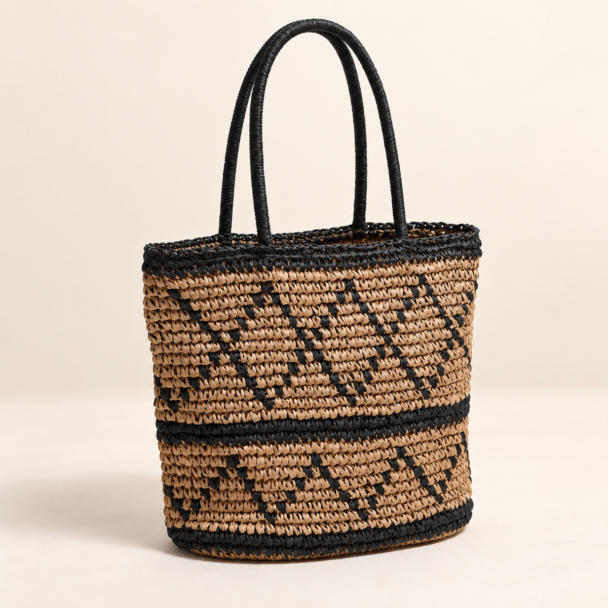 Diamond Weave Shoulder Bag, angled view showing a diamond pattern and black handles