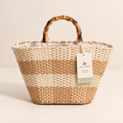 Grid Woven Tote in cream and tan with a Solace & Straw hangtag