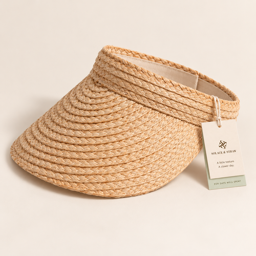 Open Top Straw Visor in natural straw with a Solace & Straw hangtag