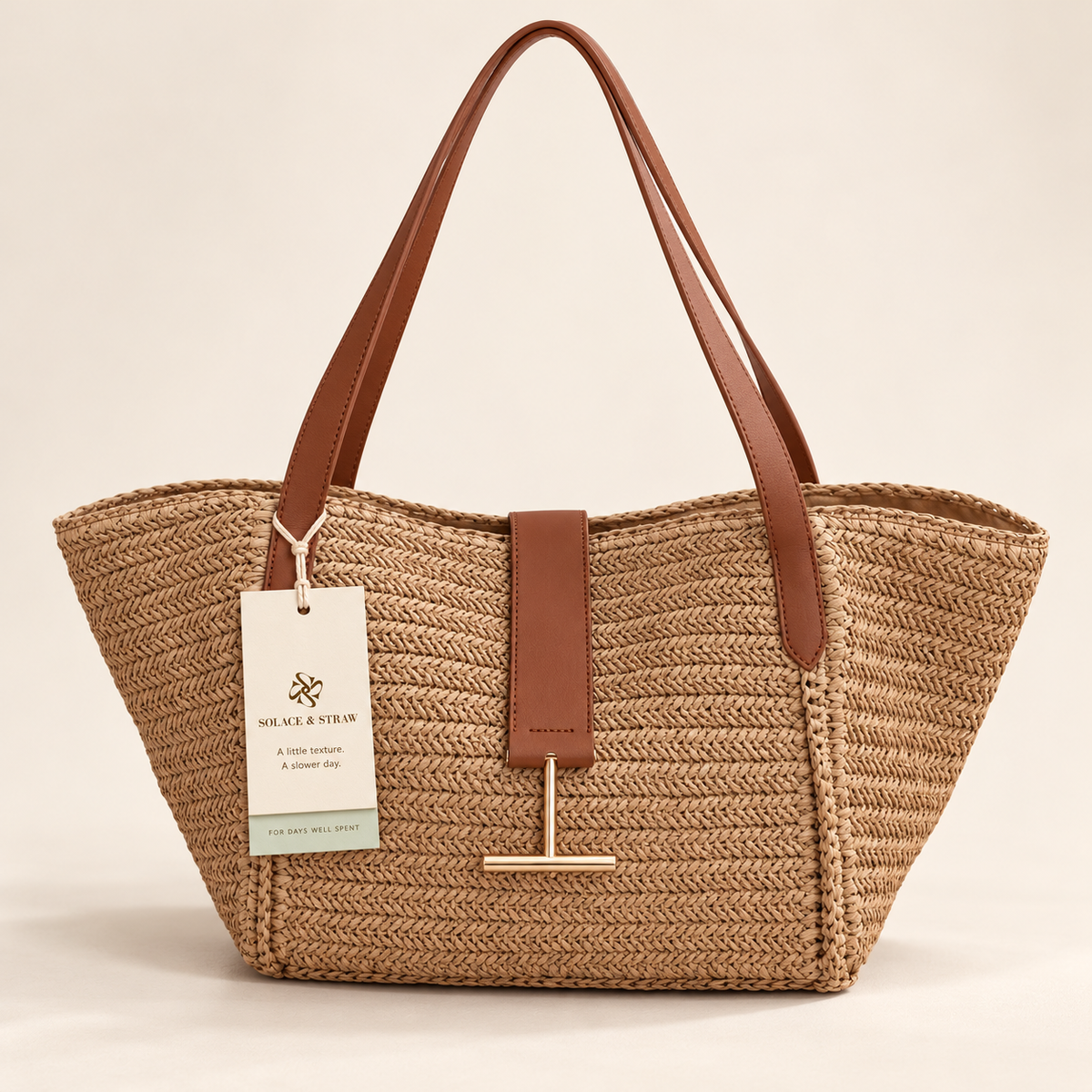 Bar Detail Woven Basket Tote in tan / brown trim, front view with Solace & Straw hangtag