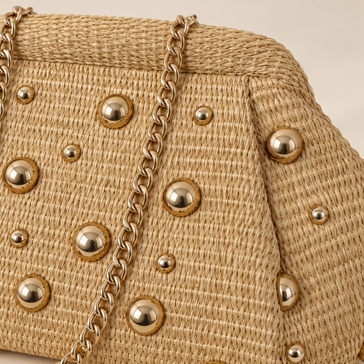 Gold Stud Woven Clutch, close-up of the woven texture and visible construction