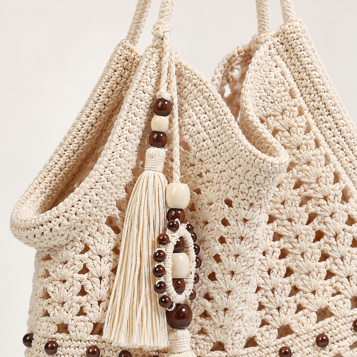 Ivory Crochet Tassel Hobo, close-up of the crochet texture and visible construction