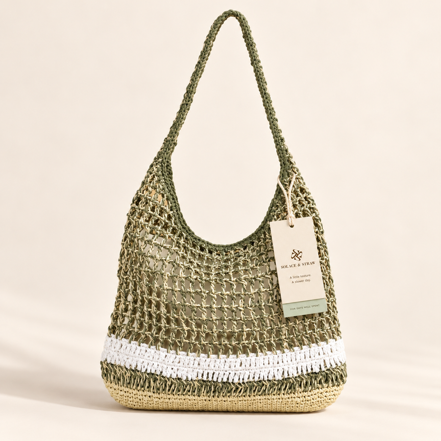 Marled Paper Woven Shoulder Bag in green / ivory / white, front view with Solace & Straw hangtag