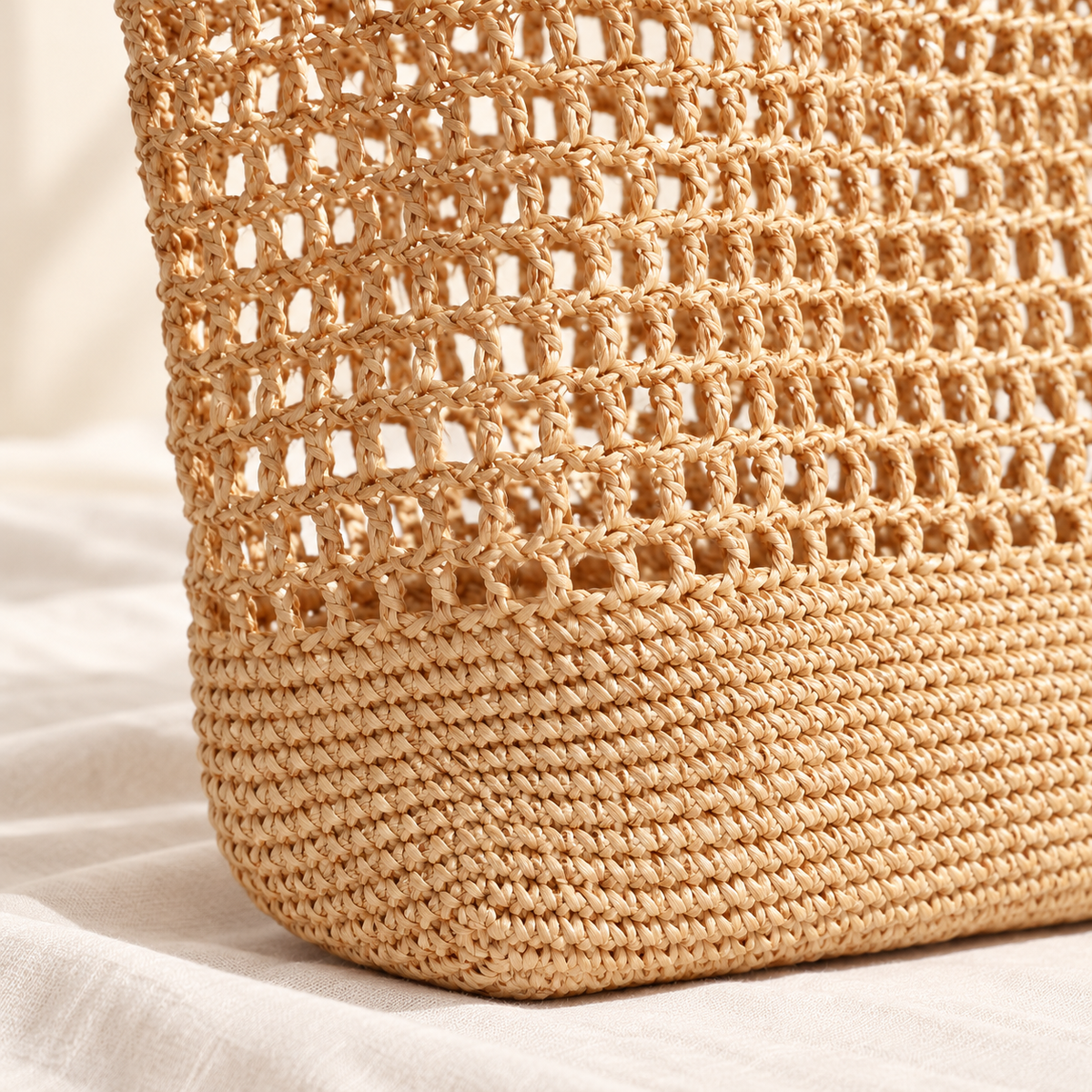 Open Weave Tote, close-up of the natural open crochet pattern and densely woven base
