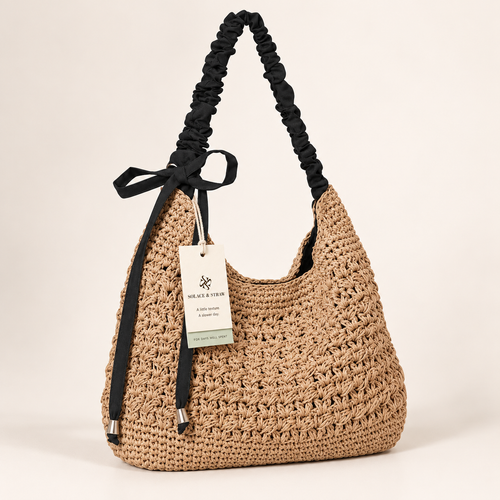 Bow Detail Woven Shoulder Bag, natural / black bow, front view with Solace & Straw hangtag